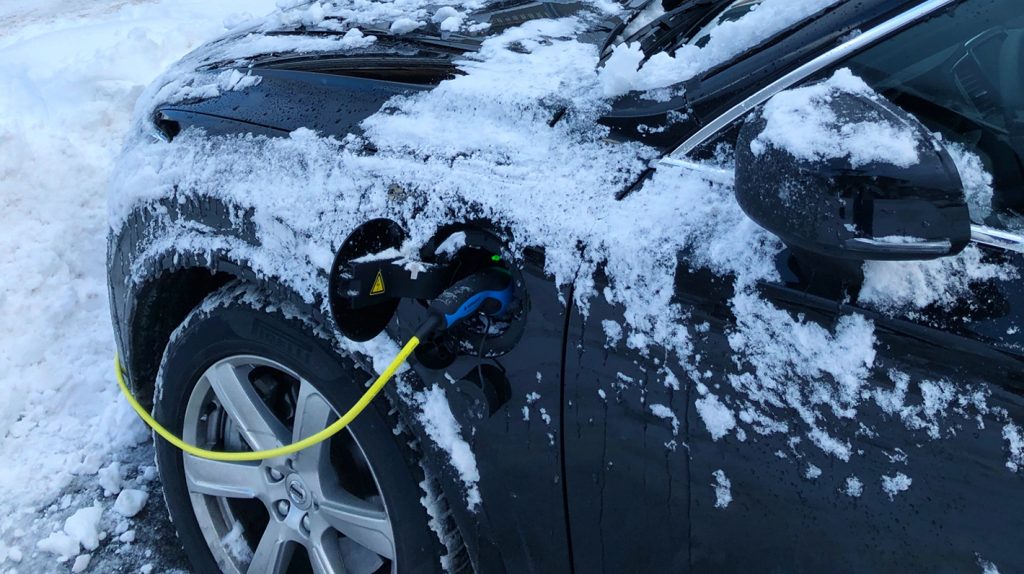 electric car charging in snow