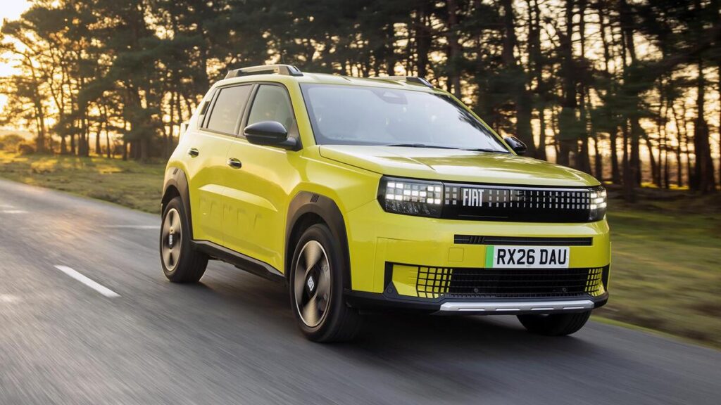 Fiat Grande Panda Electric driving on a road, one of the affordable electric cars coming in 2026